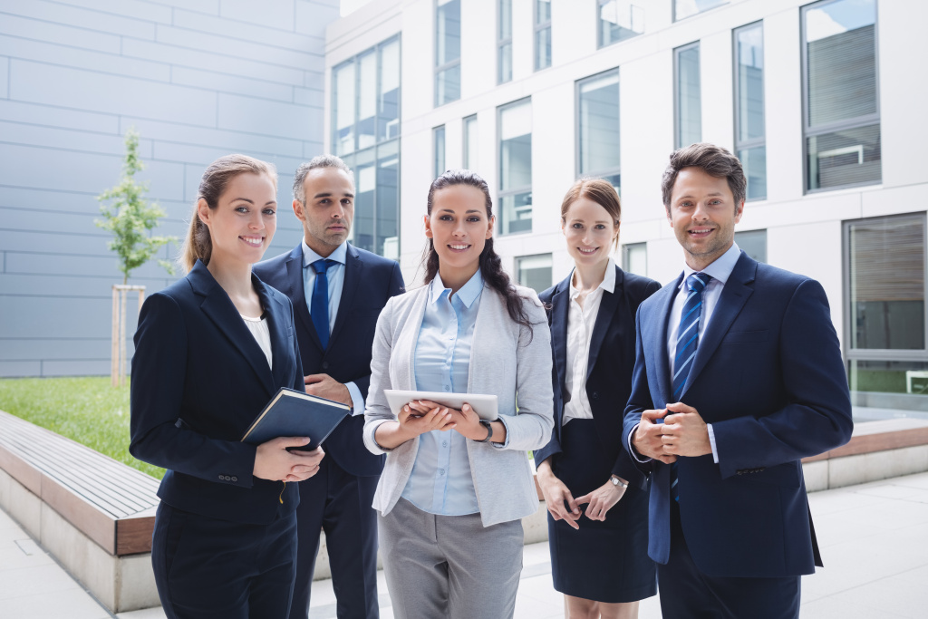 businesspeople-standing-outside-office